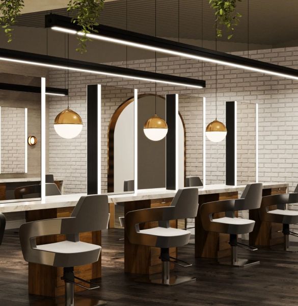 Modern hair salon interior with gold pendant lights, LED mirrors, and walnut styling stations