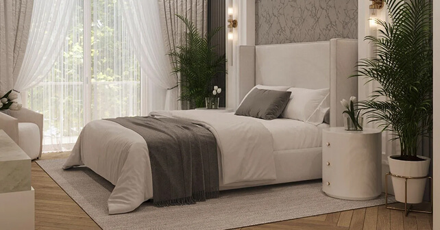 Elegant LA bedroom featuring upholstered bed, neutral palette, and tall windows