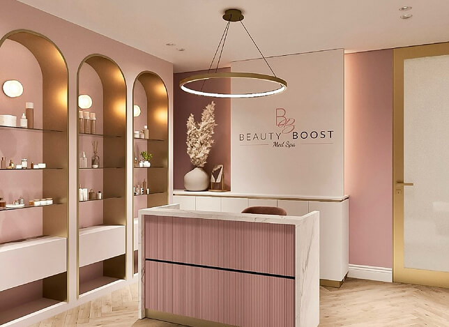 Stylish pink med-spa reception desk designed by a luxury interior designer in Los Angeles