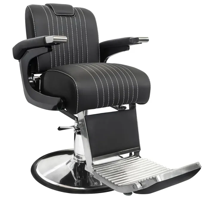 Sleek, modern black barber chair with a footrest.