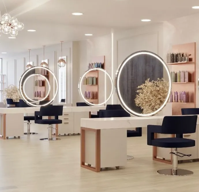 Bright salon with circular lighted mirrors and elegant decor.