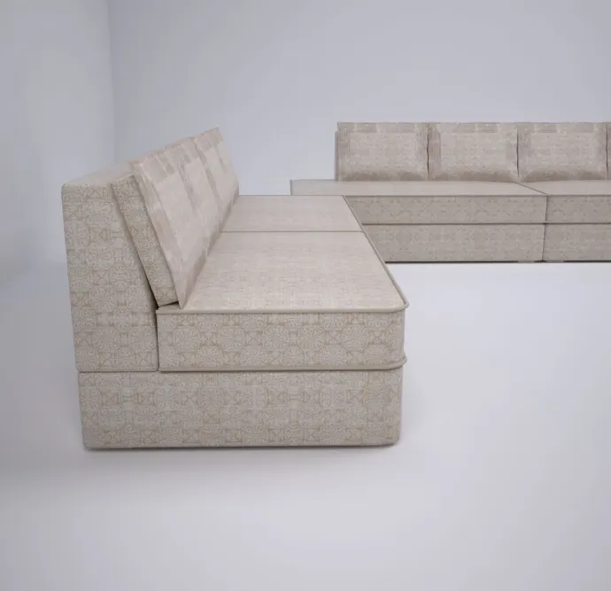 Luxurious sectional sofa with a minimalist design in soft fabric.