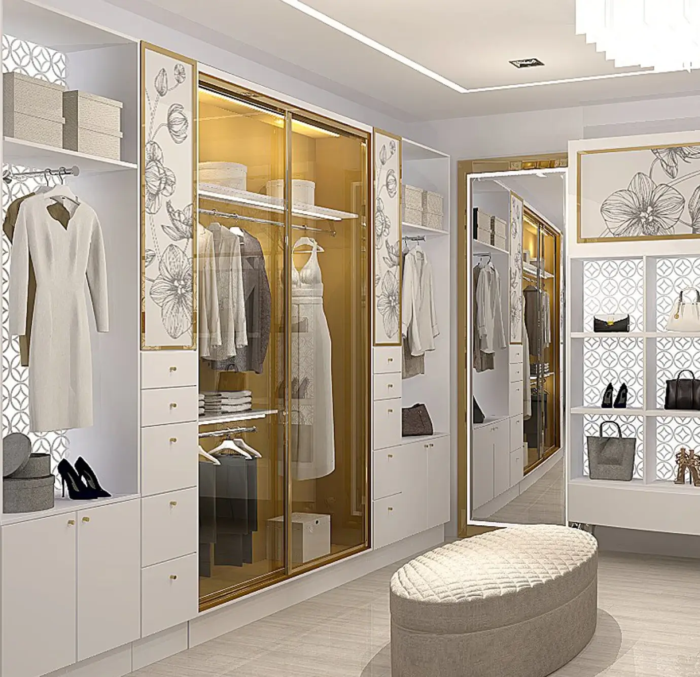 Luxury walk-in closet interior featuring white cabinetry with gold accents, amber sliding glass wardrobe doors, floral sketch back panels, geometric patterned panels, hanging clothes, drawers, an oval tufted ottoman, and recessed ceiling lighting
