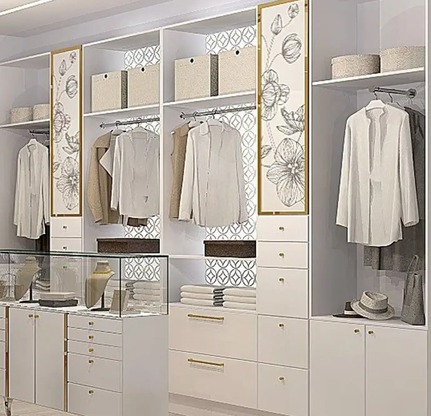 Close-up of luxury walk-in closet wall showing white open wardrobe sections with gold-framed botanical sketch panels, geometric lattice back panels, hanging clothes on chrome rails, folded linens, multiple small drawers, and a glass-topped jewelry display counter